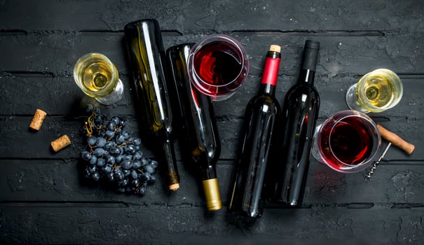 Wine background. Red and white wine. photo