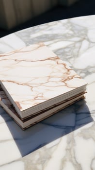 white and square notebook on a marble background photo