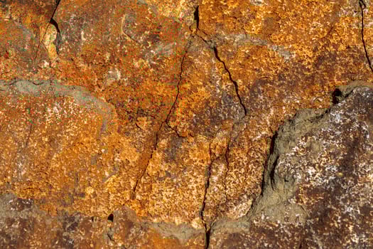 Background of a stone and metal texture. The perfect combination of strength and elegance. photo