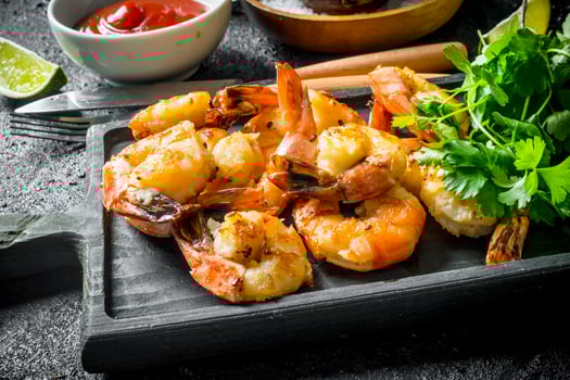 Freshly cooked shrimps with parsley. photo