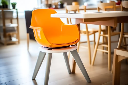 Conventional baby feeding chair in the dining table at home or kitchen. Child high chair furniture concept by AI Generated photo