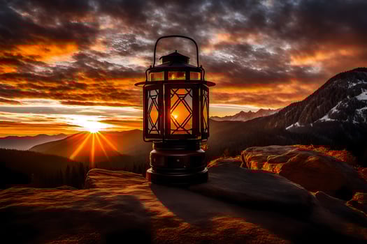 a lantern is lit on top of a mountain at sunset. AI-Generated photo