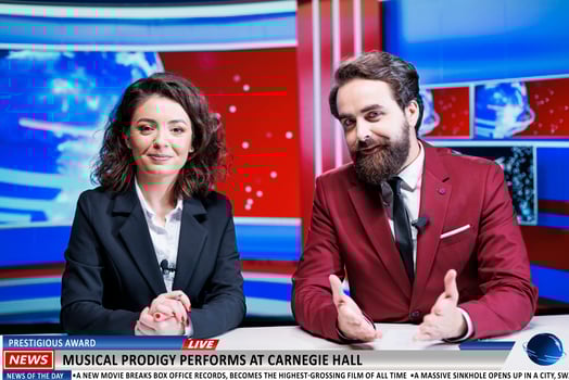 Presenters team announce new concert, famous artist hosting musical performance at historical hall in newsroom. Journalists reporting live on morning show, leisure event in town. photo