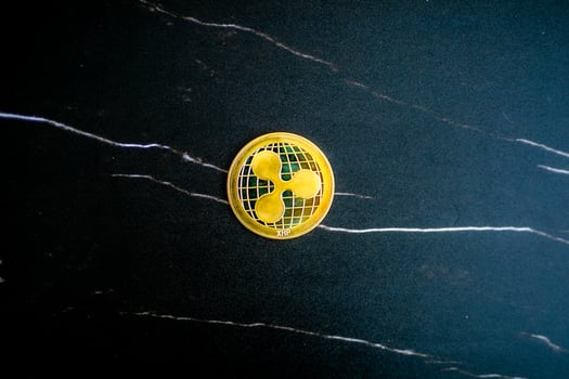 XRP coin XRP on black marble texture. photo