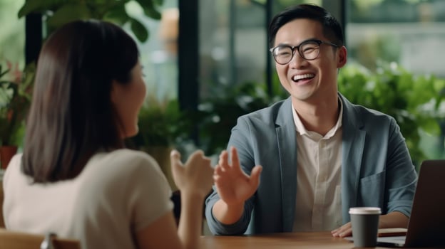 Asian businessman wearing glasses, smiling and waving at his colleague AI Generated photo