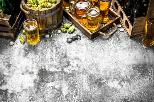 Beer background. Fresh beer with ingredients. photo