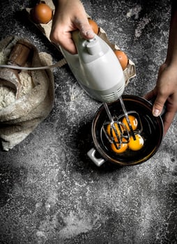 Dough background. A woman is preparing a fresh dough. photo