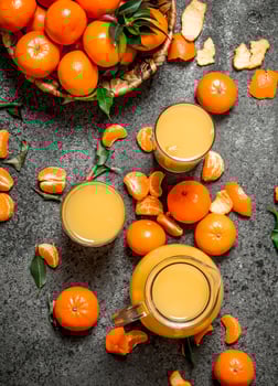 Freshly squeezed juice of ripe tangerines. photo