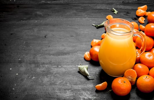 Fresh juice from tangerines in a jar. photo
