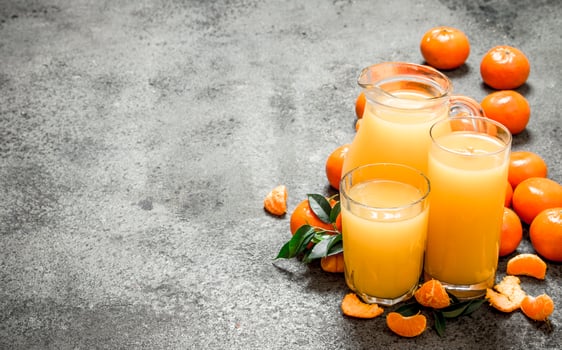 Freshly squeezed juice of ripe tangerines. photo