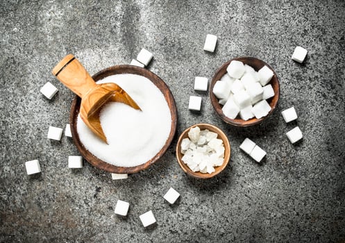 White sugar in bowls. photo