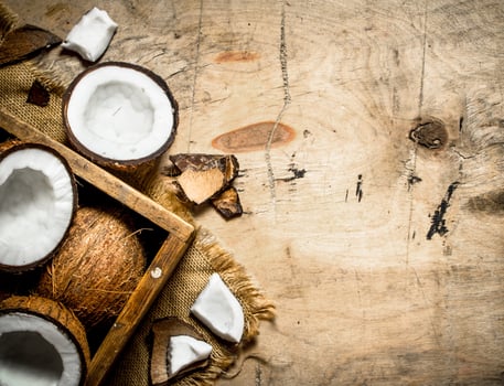 Fresh coconuts in an old box. photo