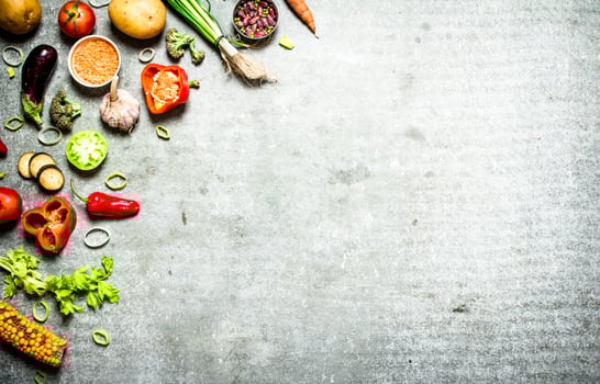 Organic food. Fresh slices of vegetables with spices. photo