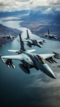 Fighter jets flying in formation over the ocean photo