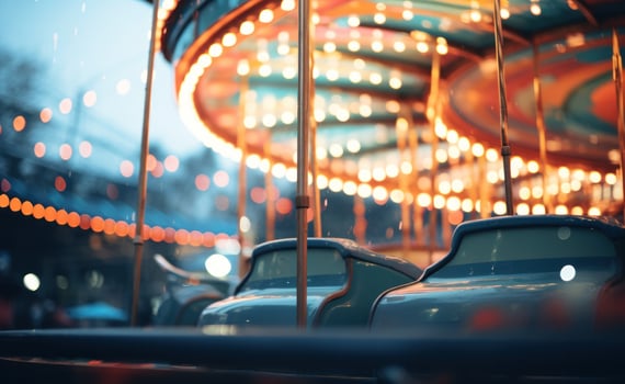 a blurry background of the fairground ride photo