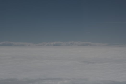 clouds over the sky and sea photo
