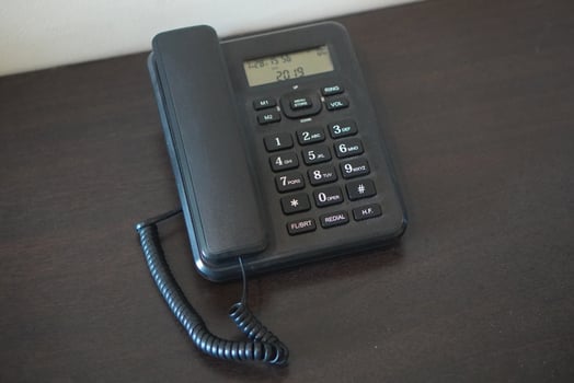top view antique black plastic telephone on wooden table background, object, technology, copy space photo