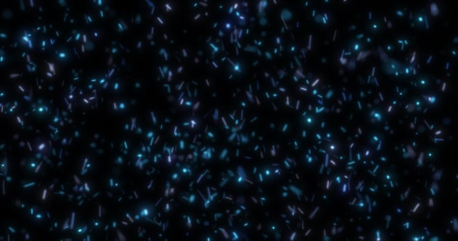Abstract bright background of flying blue glowing light fire sparks from a fire on a black background photo