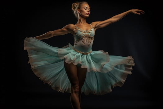 A ballerina caught mid leap in a stunning display of grace and athleticism photo