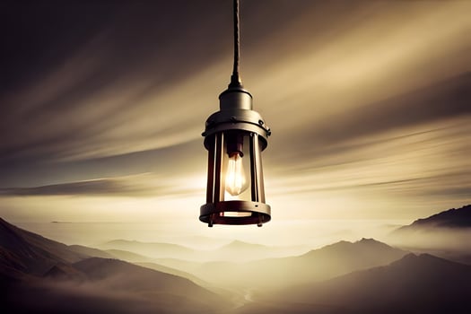 a light bulb hanging from a metal pole in front of a mountain range. AI-Generated photo