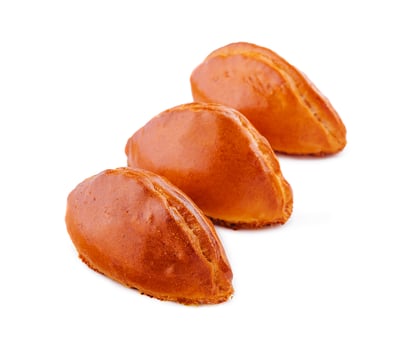 baked stuffed pies on a white plate photo