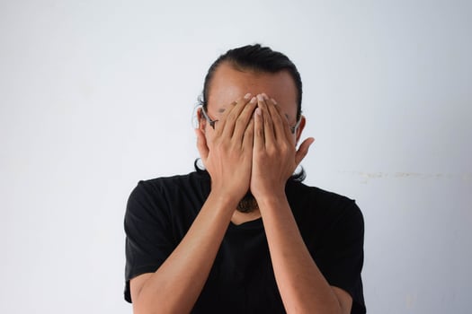 Adult Asian man wearing black t-shirt photo