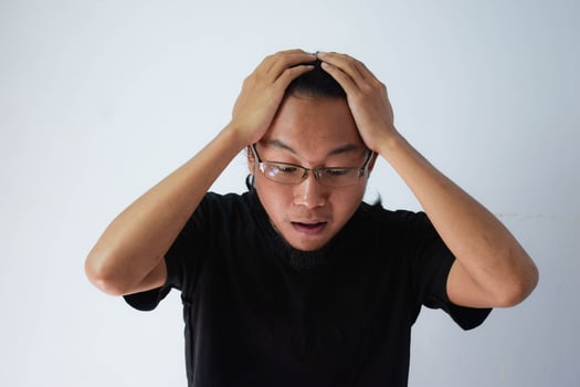 Adult Asian man wearing black t-shirt photo