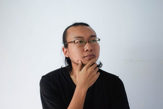 Adult Asian man wearing black t-shirt photo