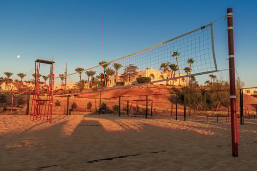 Volleyball net in the morning on beach photo