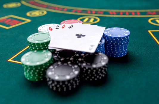 Poker chips on a table at the casino photo