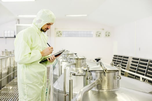 Food beverage worker working check fermentation tank with clean hygiene condition workplace. photo