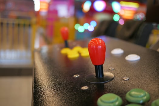 closeup of button on games machine. photo