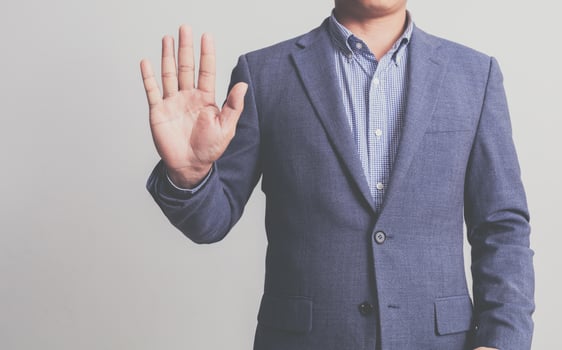 Businessman wearing a suit on a white background photo