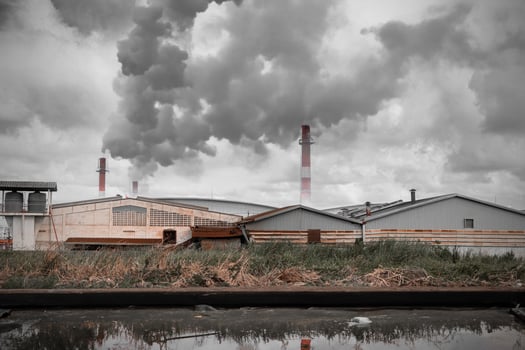 Industry factory area dirty air and water pollution drain waste water and smoke chimney danger for environment and ecology photo