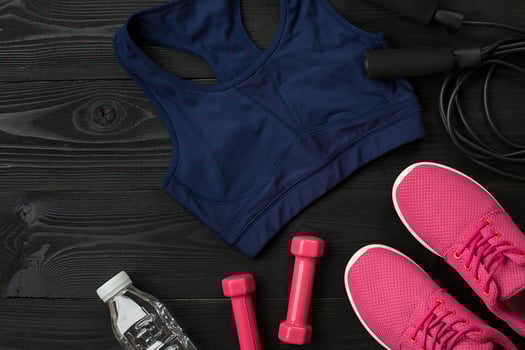 Sports accessories for fitness on the wooden floor. Healthy lifestyle concept. photo