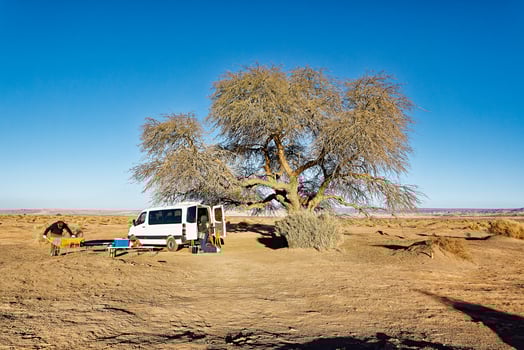 San Pedro de Atacama - El Loa - Antofagasta Region - Chile. Tourists enjoy breakfast at dawn in the Atacama Desert landscape. photo