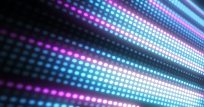 Abstract bright blue background pattern of flying circles of dots and glowing futuristic digital energy magical bright particles photo