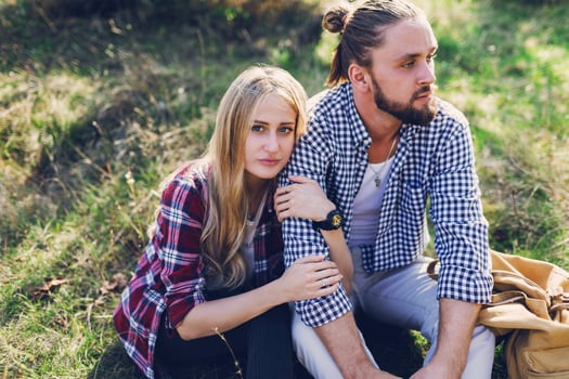 Romantic couple has beautiful moments of happiness and joy summer park. Love and tenderness.Lifestyle concept. Wearing striped shirt. photo