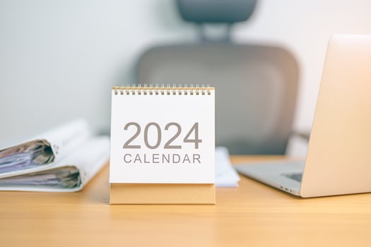 2024 Year Calendar on table background. countdown, Happy New Year, Resolution, Goals, Plan,  Action, Mission and financial Concept photo