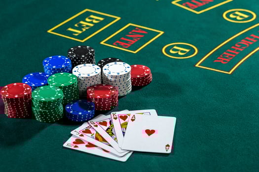 Poker play. Chips and cards photo