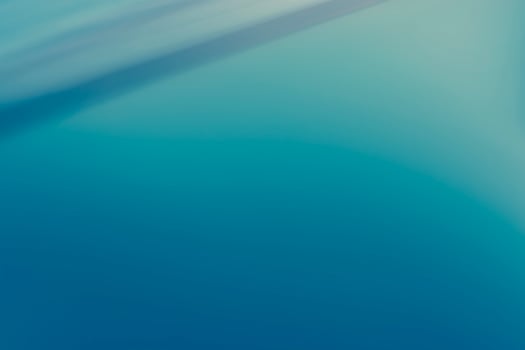 abstract blue background with some smooth lines in it and some motion blur photo