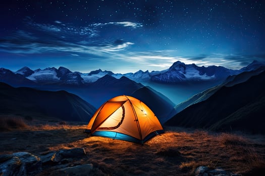Tourist tent in the mountains at night with starry sky, Illuminated camp tent under a view of the mountains and a starry sky, AI Generated photo