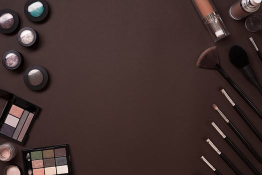 The women's cosmetics set on a brown background, modern woman. photo