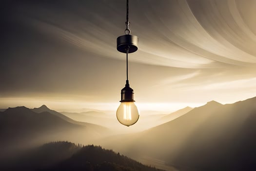a light bulb hanging from a rope over a mountain range. AI-Generated photo