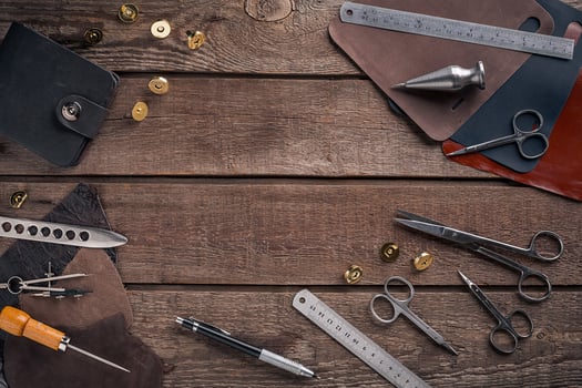 Leather crafting. Tools flat lay still life photo