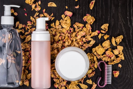 Petals, dry flowers and women's accessories. Flat lay, Top view photo