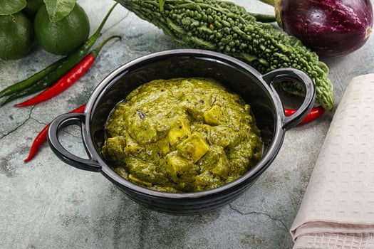 Indian cuisine - palak paneer cheese with spinach photo