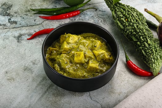Indian cuisine - palak paneer cheese with spinach photo