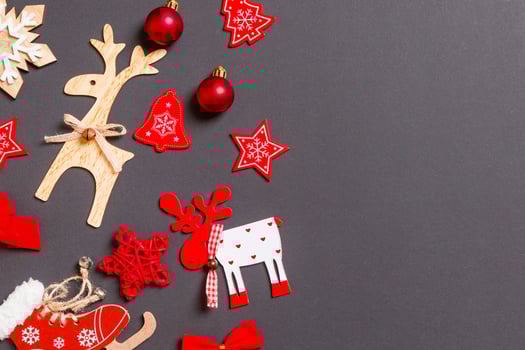 Christmas black background with holiday toys and decorations. Happy New Year concept with empty space for your design photo