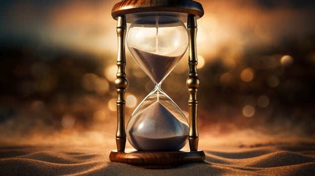 antique hourglass time running out of sand photo